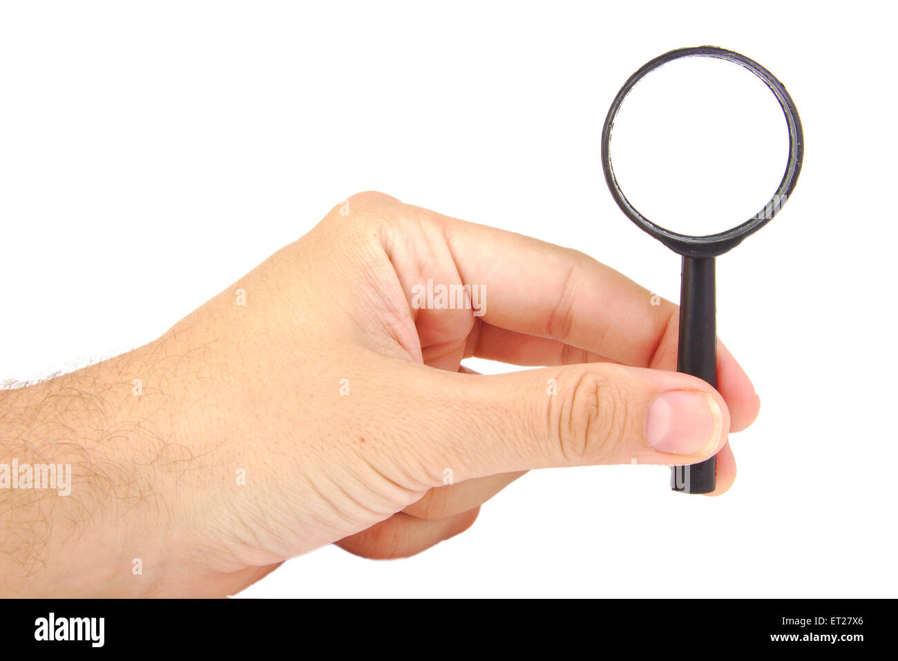 Magnifying glass in hand isolated on a white background Stock Photo Alamy