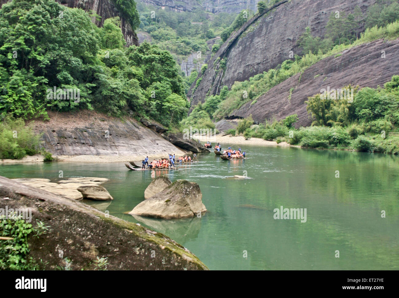 rafting on a bamboo raft in the beautiful mountain gorge. Stock Photo