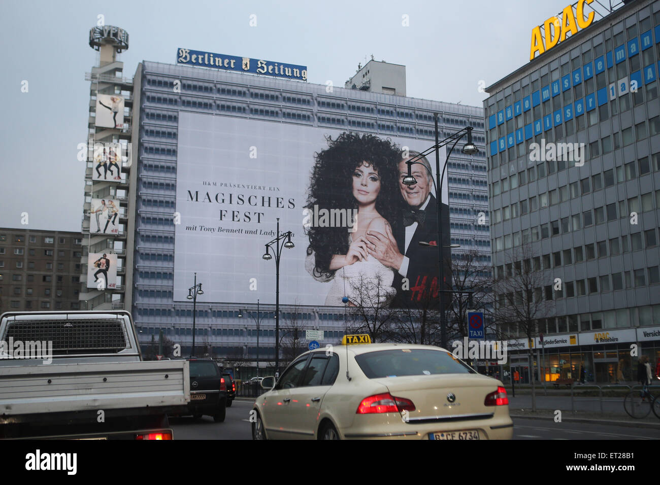 A giant billboard of Lady Gaga and Tony Bennett advertising Swedish fashion  retailer H&M covering Berliner Verlag building at Alexanderplatz in Mitte.  Featuring: Atmosphere Where: Berlin, Germany When: 06 Dec 2014 Credit: