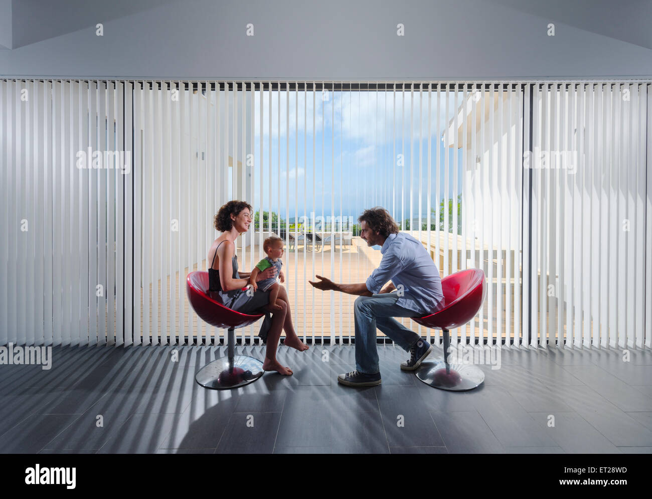 Happy family indoors hi-res stock photography and images - Alamy