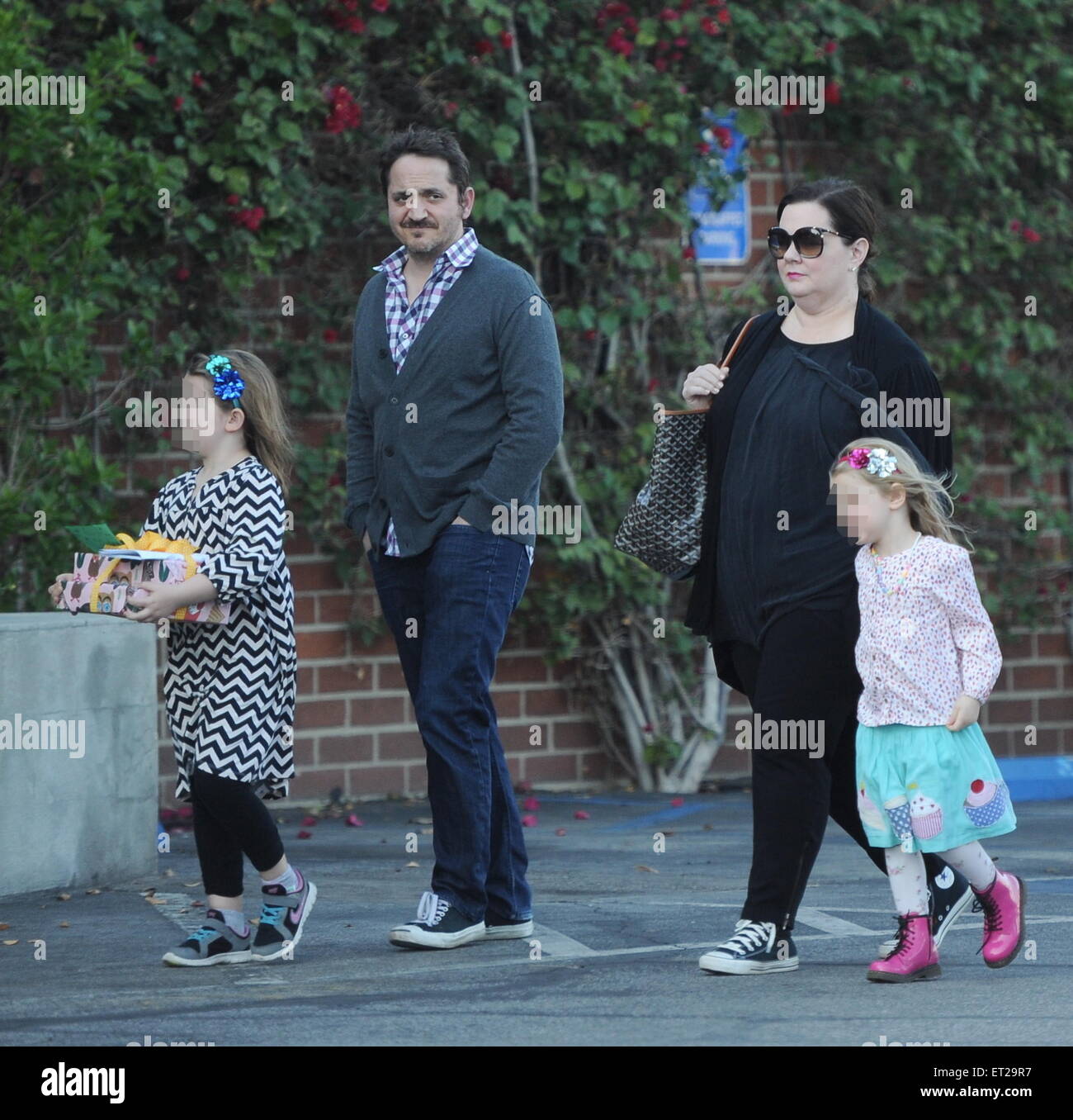 Melissa McCarthy and husband Ben Falcone take their daughters Vivian Stock  Photo - Alamy