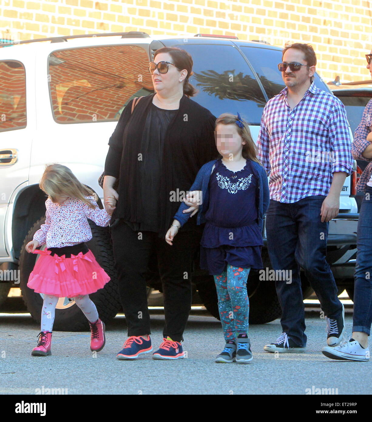 Melissa McCarthy and husband Ben Falcone take their daughters Vivian
