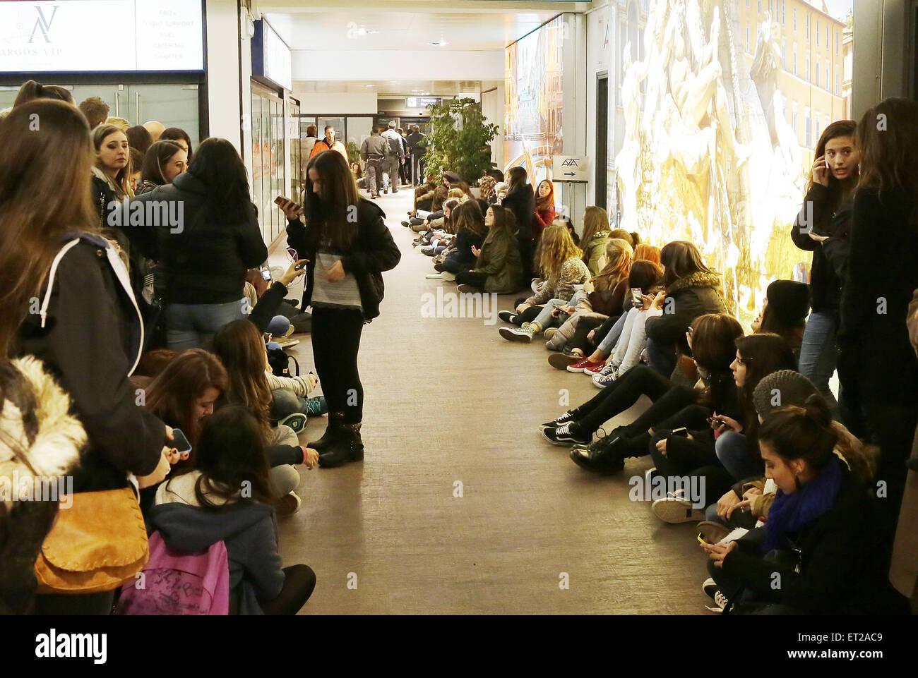 Fans wait for One Direction at Rome Ciampino Airport Featuring ...