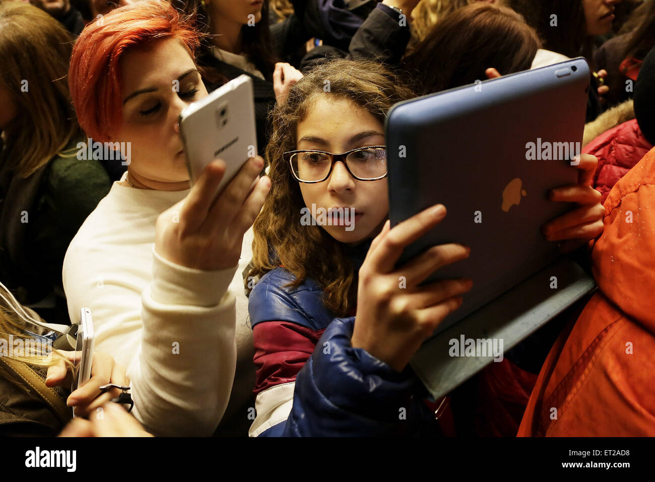Fans wait for One Direction at Cavalieri Hilton Hotel Featuring ...