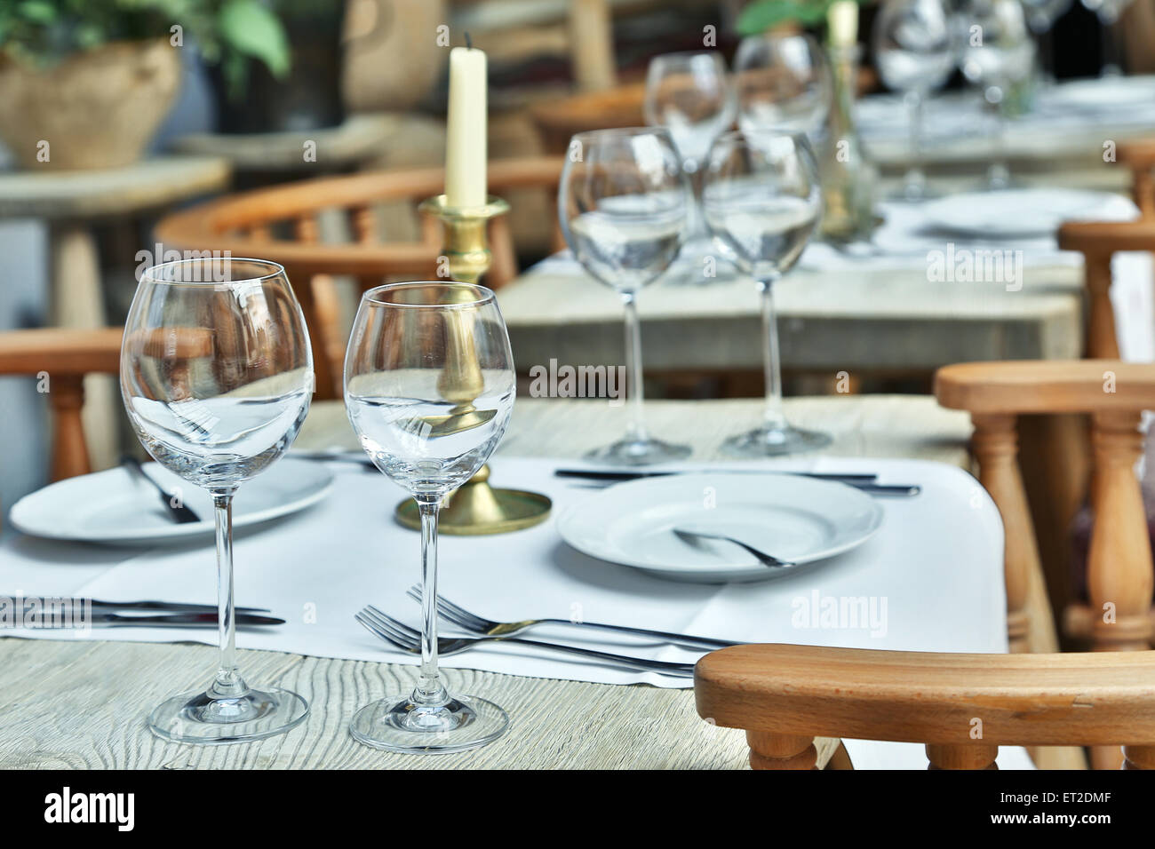 Table setting with wine glasses at the vintage café Stock Photo - Alamy