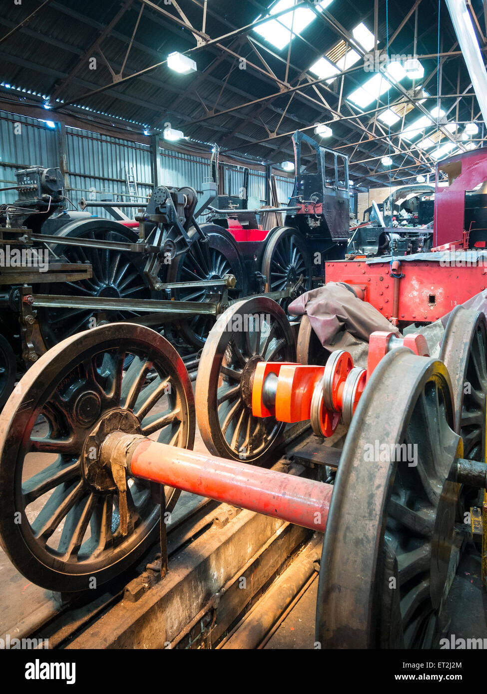 vintage steam locomotive in the maintenance shed at Loughborough station, on the Great Central Railway in Leicestershire,UK Stock Photo