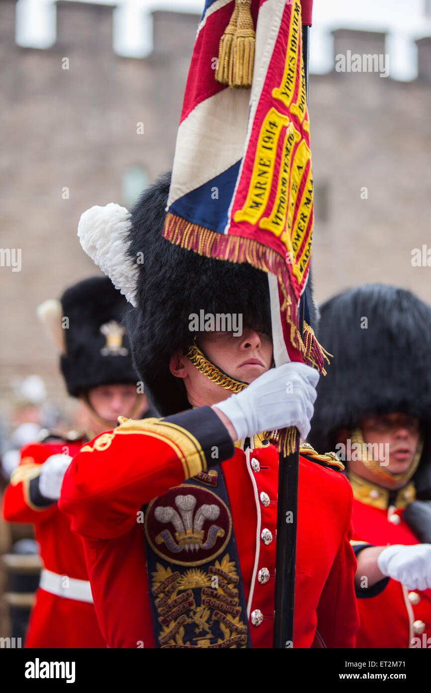 Cardiff, Wales, UK. 11th June, 2015. Roads were closed and crowds lined the streets in Cardiff city centre this morning as the Queen arrived to present new regimental colours to the Royal Welsh Regiment. The regiment, led by the Goat Major and the regimental mascot, Shenkin, marched from Cardiff Castle to the Millennium Stadium where the formal ceremony will take place. The Queen will then be the guest of the regiment for a celebratory dinner. Credit:  Chris Stevenson/Alamy Live News Stock Photo