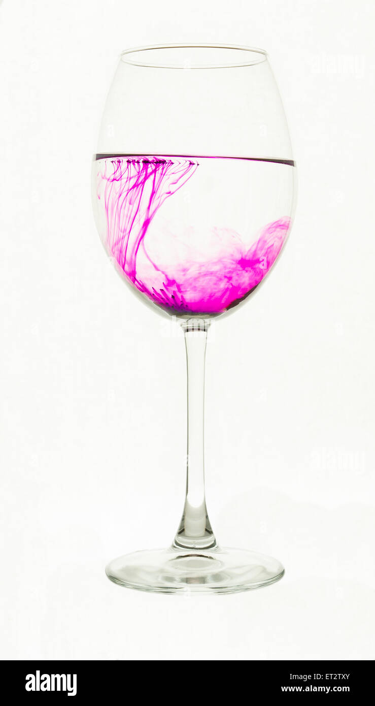 a few grains of potassium permanganate are dissolved in water Stock