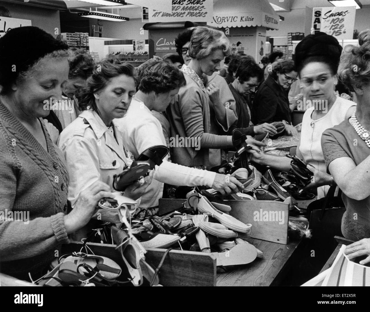 Birmingham Shopping Series.  Customers looking at shoes on sale in Clark's shoe shop. Birmingham. June 1968. Stock Photo