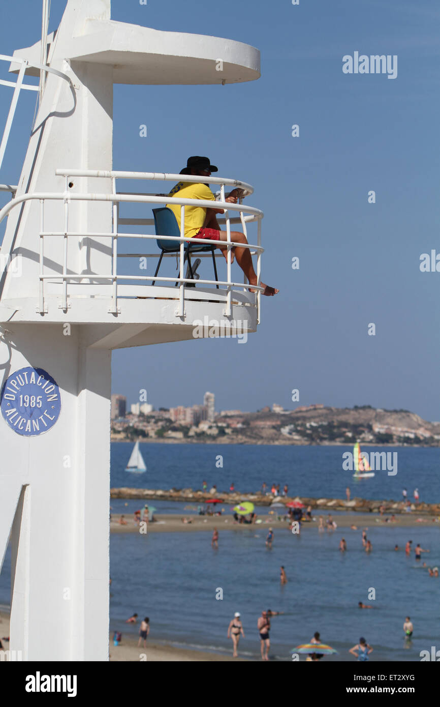 Life Guard  in Tower on Beach with sun hat (credit image © Jack Ludlam) Stock Photo