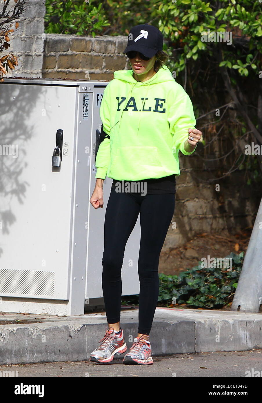 Lisa Rinna wearing a bright, fluorescent green hoodie with the word 'YALE'  printed across the chest while out power walking in Los Angeles Featuring:  Lisa Rinna Where: Los Angeles, California, United States