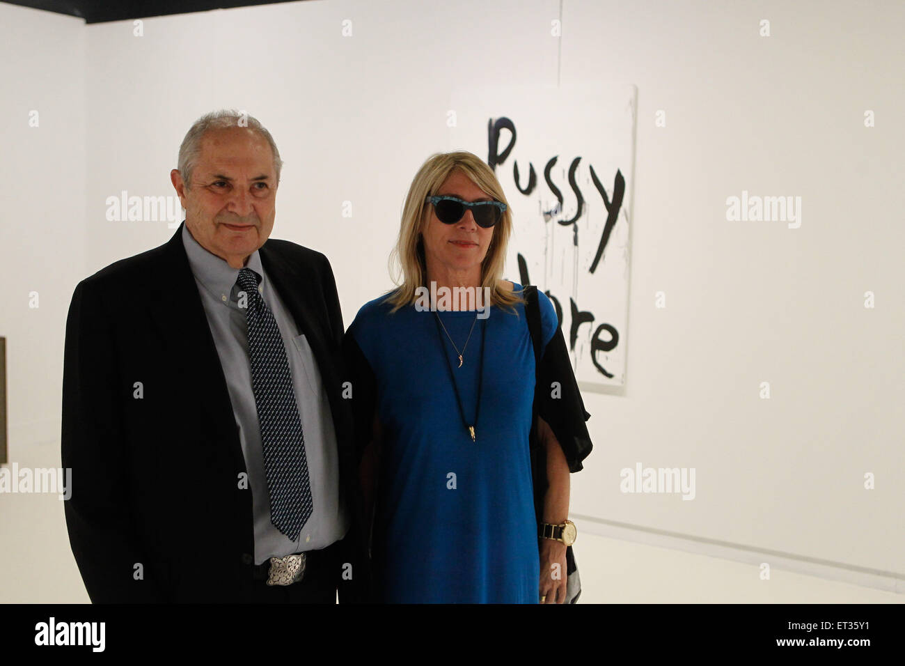 Athens, Greece. 11th June, 2015. Dakis Joannou with Kim Gordon at the Benaki museum. Benaki Museum presents the exhibition ''Kim Gordon - Design Office: Noise Name Paintings and Sculptures of Rock Bands that are broken up''. At her exhibition at the Benaki Museum, Kim Gordon presents a selection of the ''Noise Paintings'' along with a new body of work. The long, hall-like room at the Benaki Museum, Main Building is a memorial to bands that worked with dissonance and aspects of what is now called noise music. Credit:  ZUMA Press, Inc./Alamy Live News Stock Photo
