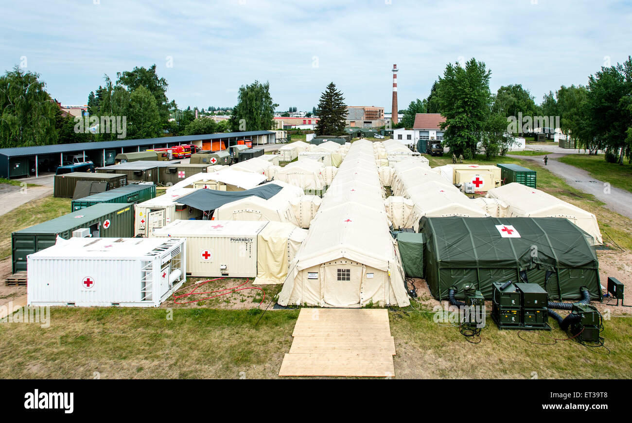 Hradec Kralove, Czech Republic. 11th June, 2015. The multinational military medical exercise Vigorous Warrior 2015, in which 350 military medics from 15 countries practicing mutual cooperation continues in Hradec Kralove, Czech Republic, June 11, 2015. © David Tanecek/CTK Photo/Alamy Live News Stock Photo