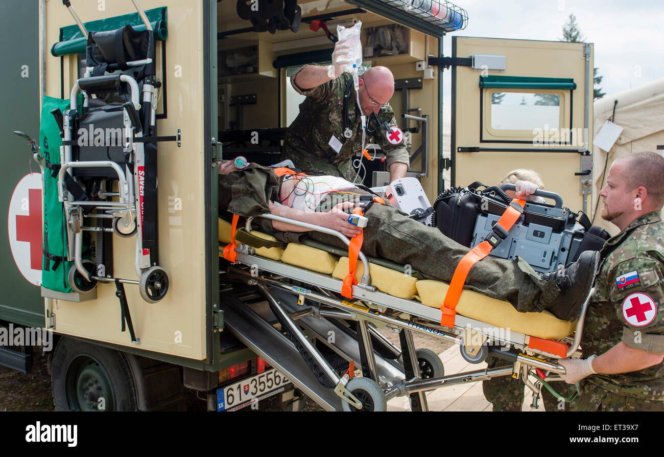 Hradec Kralove, Czech Republic. 11th June, 2015. The multinational military medical exercise Vigorous Warrior 2015, in which 350 military medics from 15 countries practicing mutual cooperation continues in Hradec Kralove, Czech Republic, June 11, 2015. © David Tanecek/CTK Photo/Alamy Live News Stock Photo