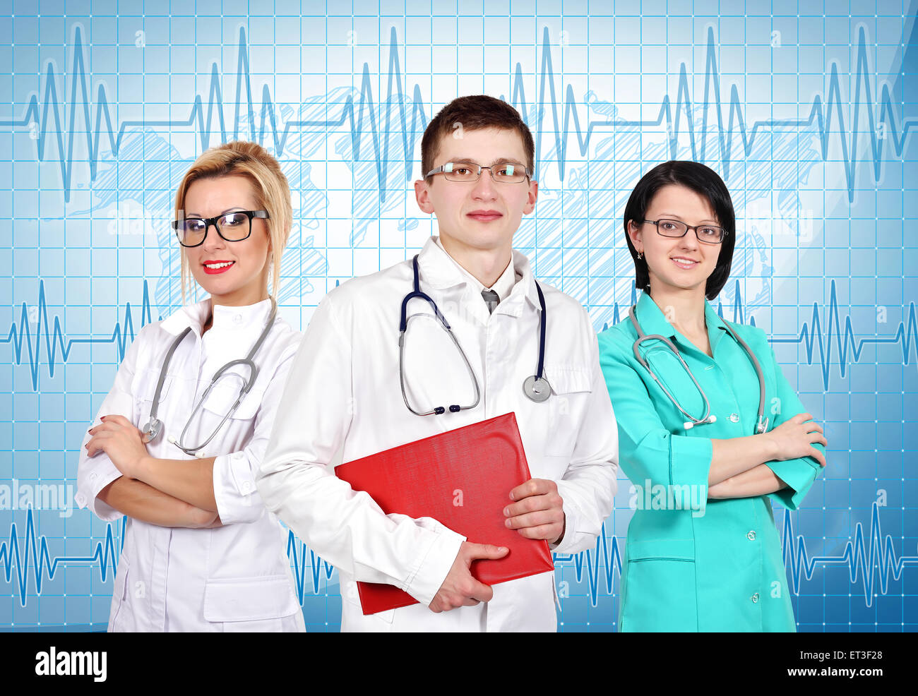 Group of doctors and nurses standing in a hospital Stock Photo