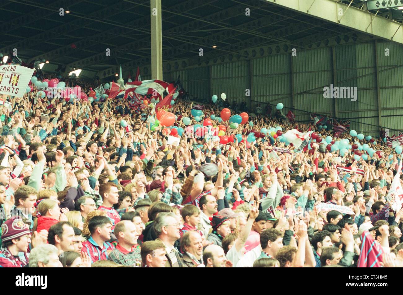 Fans in the Holte End stand in the final game before it was demolished