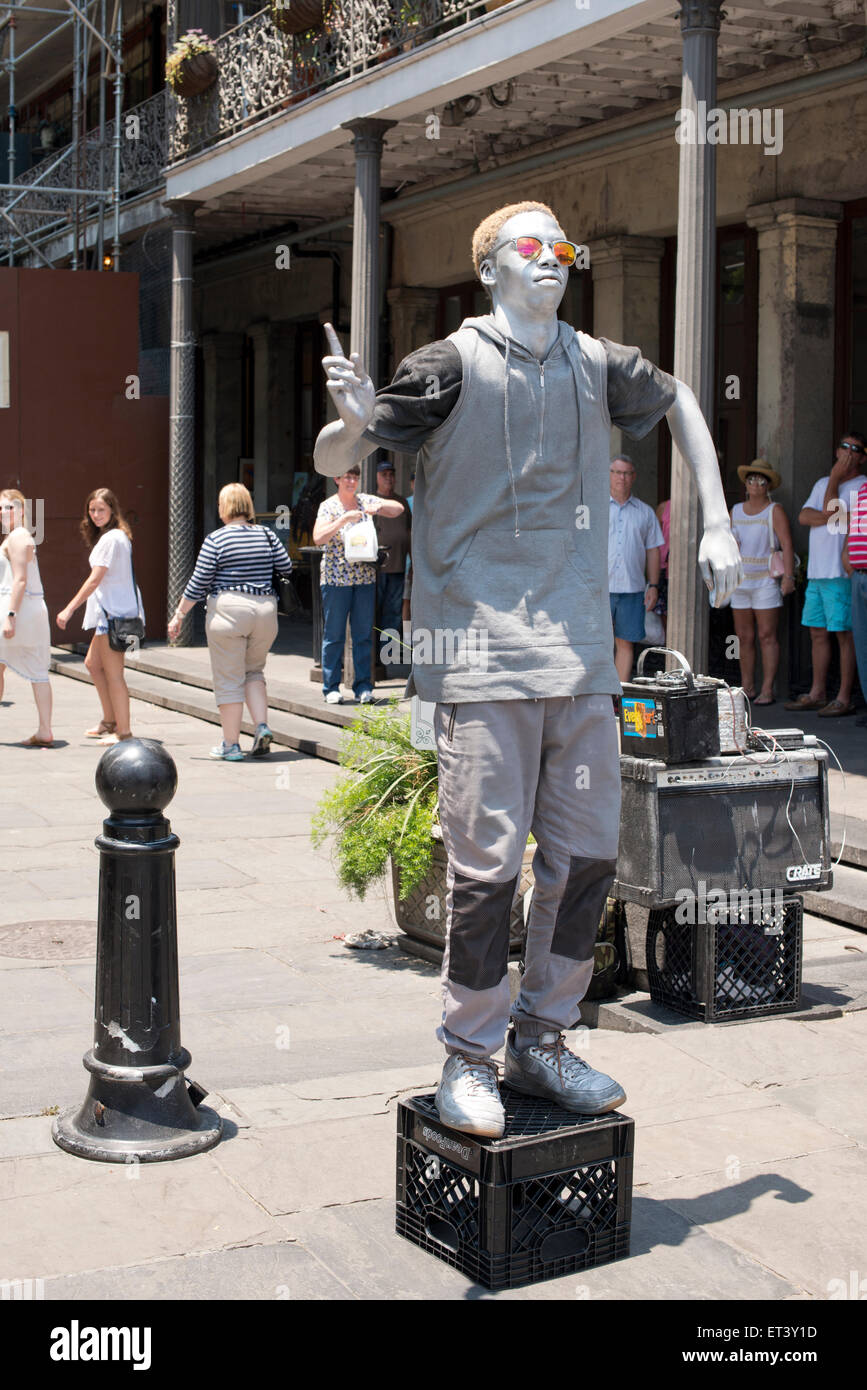 Silver painted street performer in hires stock photography and images