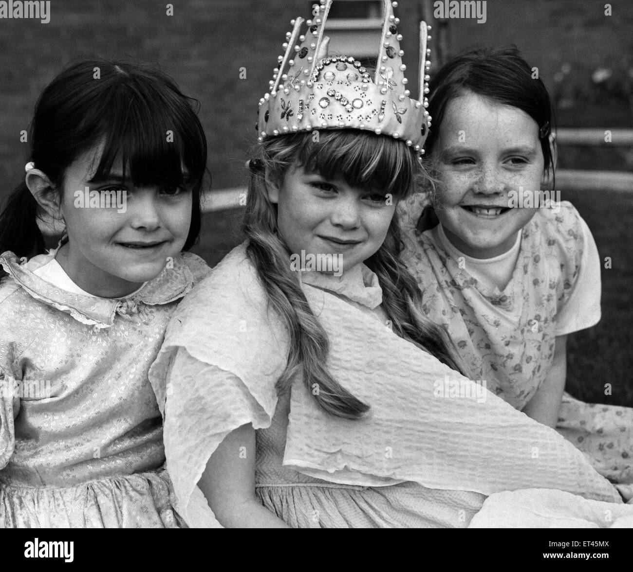 Liverpool May Day Parade, 1st May 1971. Julie Creed aged 8, dressed as May Queen, pictured with her attendants, Paula Merriman aged 7 (left) and Margaret Hoare aged 9, all three attend the Bootle Children's Social Centre. Stock Photo