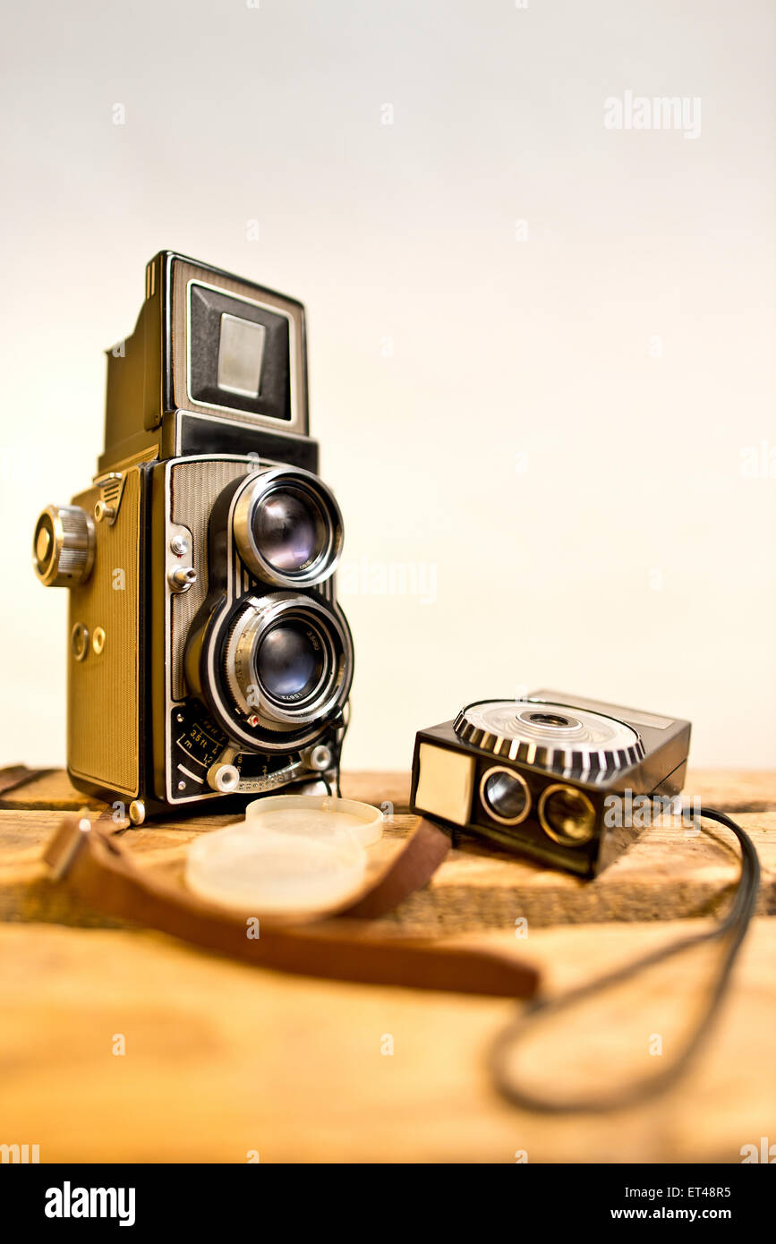 old twinlens reflex camera with light meter on the white background