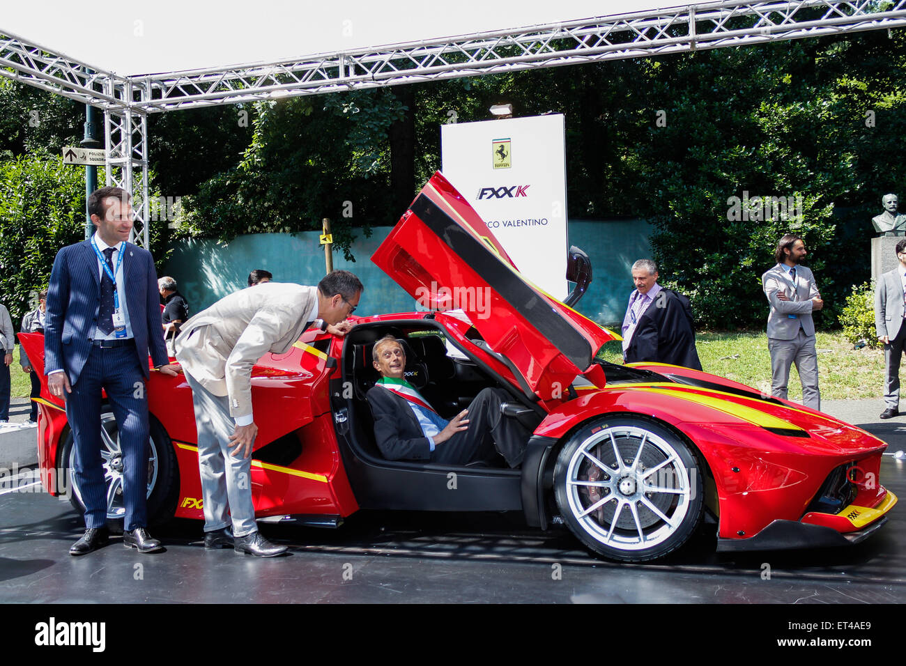 Turin, Italy. 11th June, 2015. First edition for 'Parco Valentino - Hall & Grand Prix'. At the stand Ferrari FXX K the Mayor Piero Fassino, the entrepreneur Turin Andrea Levy and Alderman Roads and Transportation of the City of Turin Claudio Lubatti. Credit:  Elena Aquila/Pacific Press /Alamy Live News Stock Photo