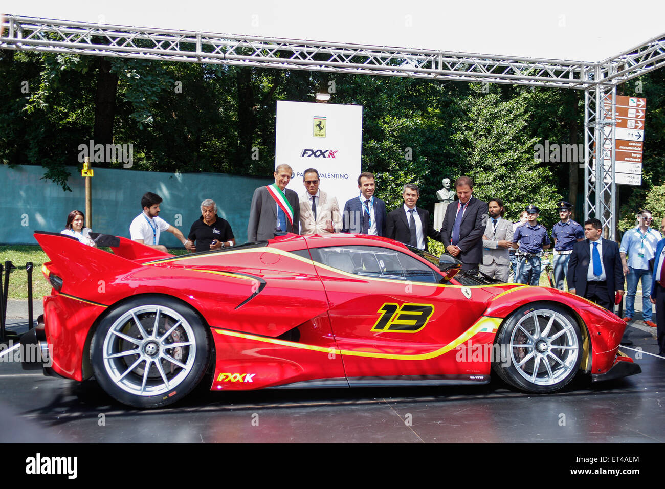 Turin, Italy. 11th June, 2015. First edition for 'Parco Valentino - Hall & Grand Prix'. At the stand Ferrari FXX K the Mayor Piero Fassino, the entrepreneur Turin Andrea Levy and Alderman Roads and Transportation of the City of Turin Claudio Lubatti. Credit:  Elena Aquila/Pacific Press /Alamy Live News Stock Photo