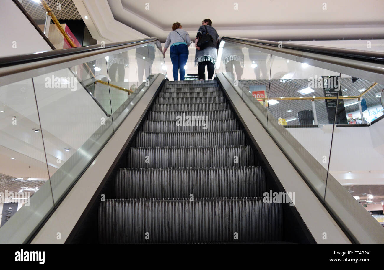Escalator inside Debenhams department store in Colchester, Essex Stock