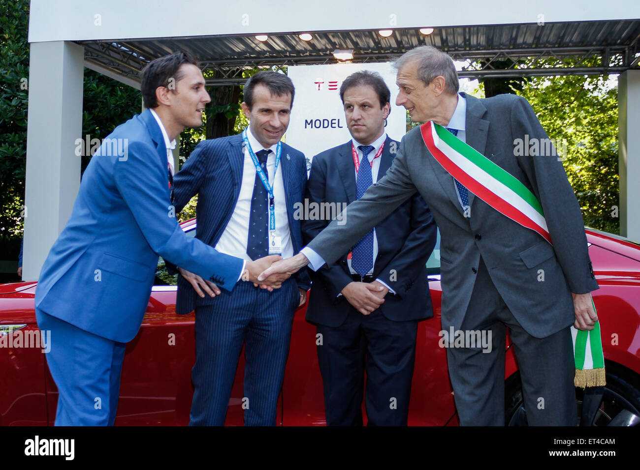 Turin, Italy. 11th June, 2015. First edition for 'Parco Valentino - Hall & Grand Prix'. At the stand Tesla the Mayor Piero Fassino, the entrepreneur Turin Andrea Levy and Alderman Roads and Transportation of the City of Turin Claudio Lubatti. Credit:  Elena Aquila/Pacific Press /Alamy Live News Stock Photo
