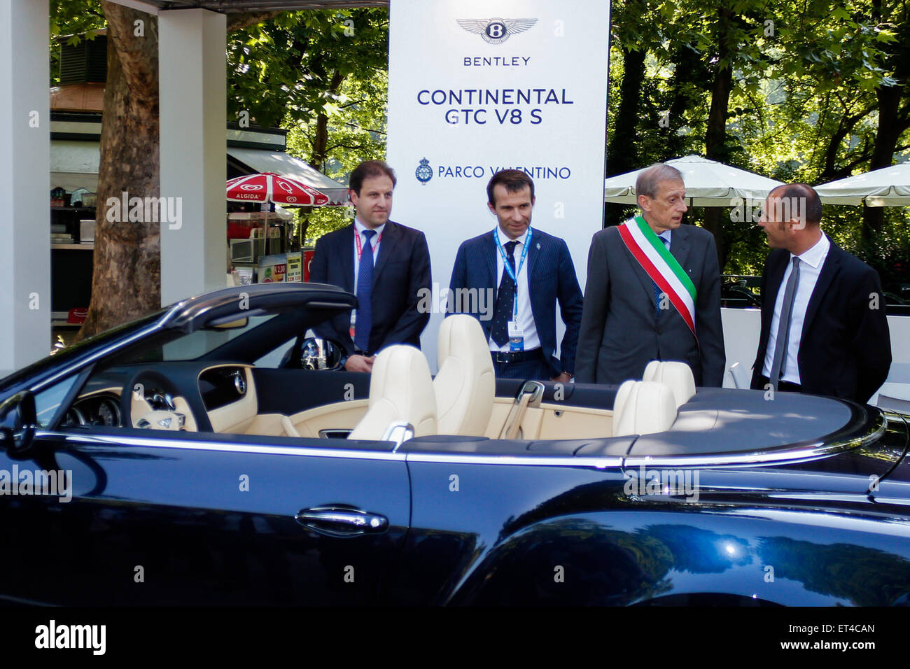 Turin, Italy. 11th June, 2015. First edition for 'Parco Valentino - Hall & Grand Prix'. At the stand Bentley Continental GTC V8 S the Mayor Piero Fassino, the entrepreneur Turin Andrea Levy and Alderman Roads and Transportation of the City of Turin Claudio Lubatti. Credit:  Elena Aquila/Pacific Press /Alamy Live News Stock Photo