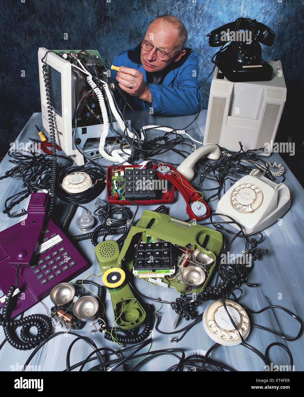 Hamburg, Germany, man repairs a complicated telephone system Stock Photo