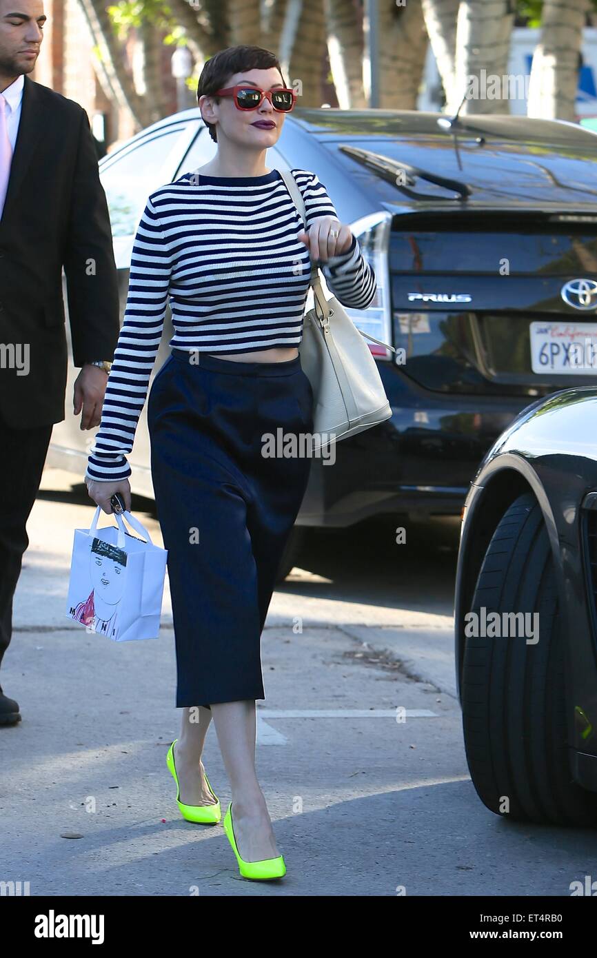 Rose McGowan went shopping on Melrose carrying her Louis Vuitton