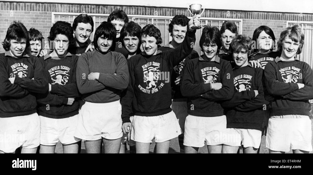 Benfield School skipper Steve Bruce holds up the Evening Chronicle Cup after his side had beaten Heaton 3-0 in today's final at Benfield Park. 11th March 1977. Stock Photo