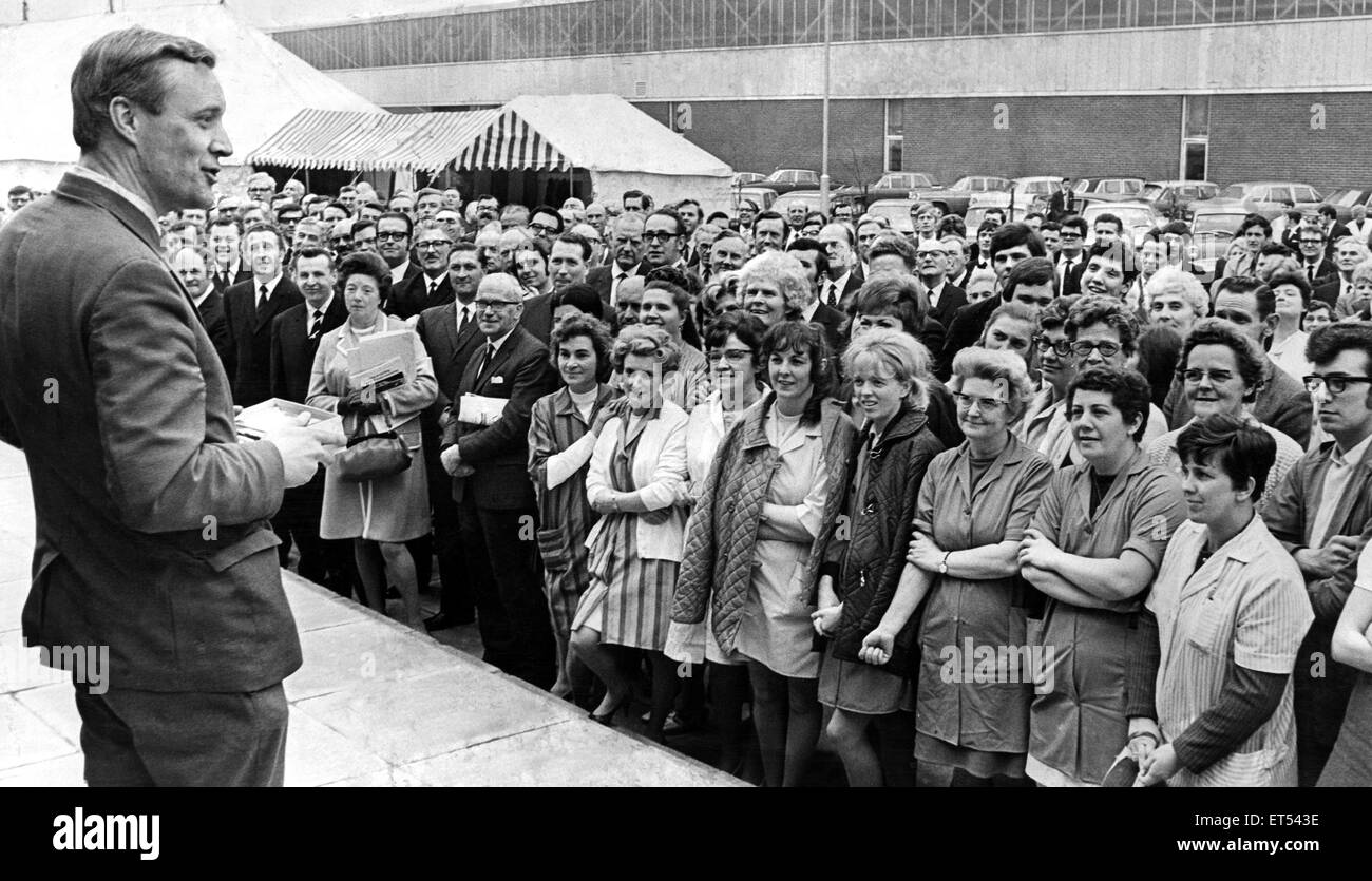 Tony Benn, was a British Labour Party politician who was a Member of Parliament (MP) for 50 years, died on 14 March 2014. Pictured, Tony Benn Talks to workers after opening the new factory of Fram Filters at Llantrisant, Wales. He said, 'Every job that go Stock Photo