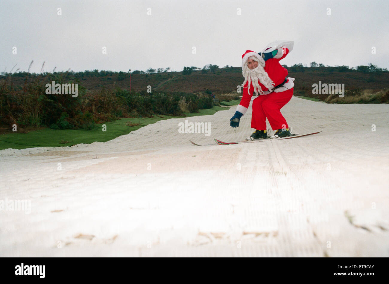Santa, alias Steve Prince, senior instructor at the Eston Ski Village gets into the mood for the Imperial Cancer Research fundraising event at the slope which takes lace in december. 27th October 1993. Stock Photo