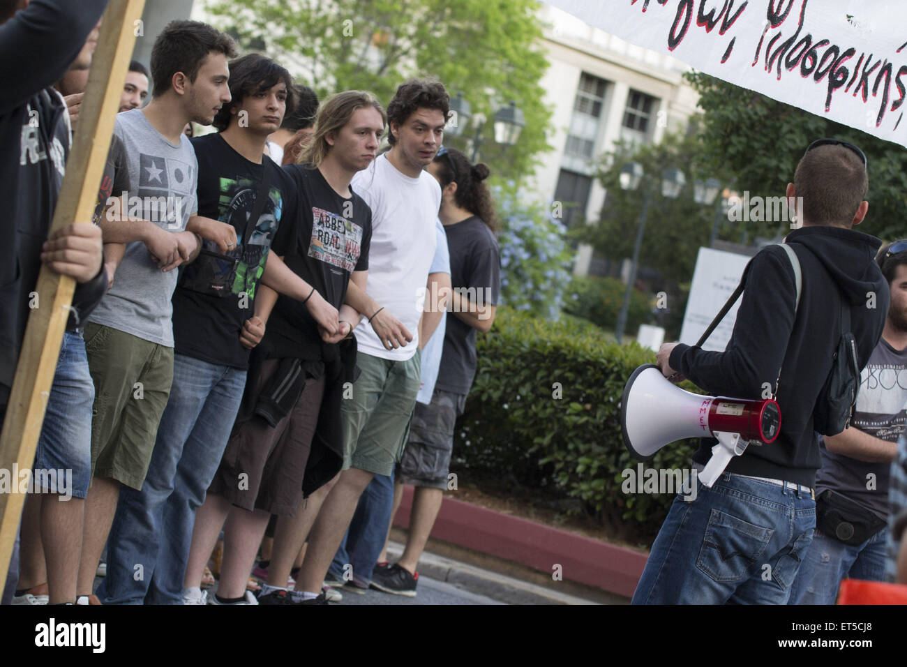 Athens, Greece. 11th June, 2015. Leftists march shouting slogans ...