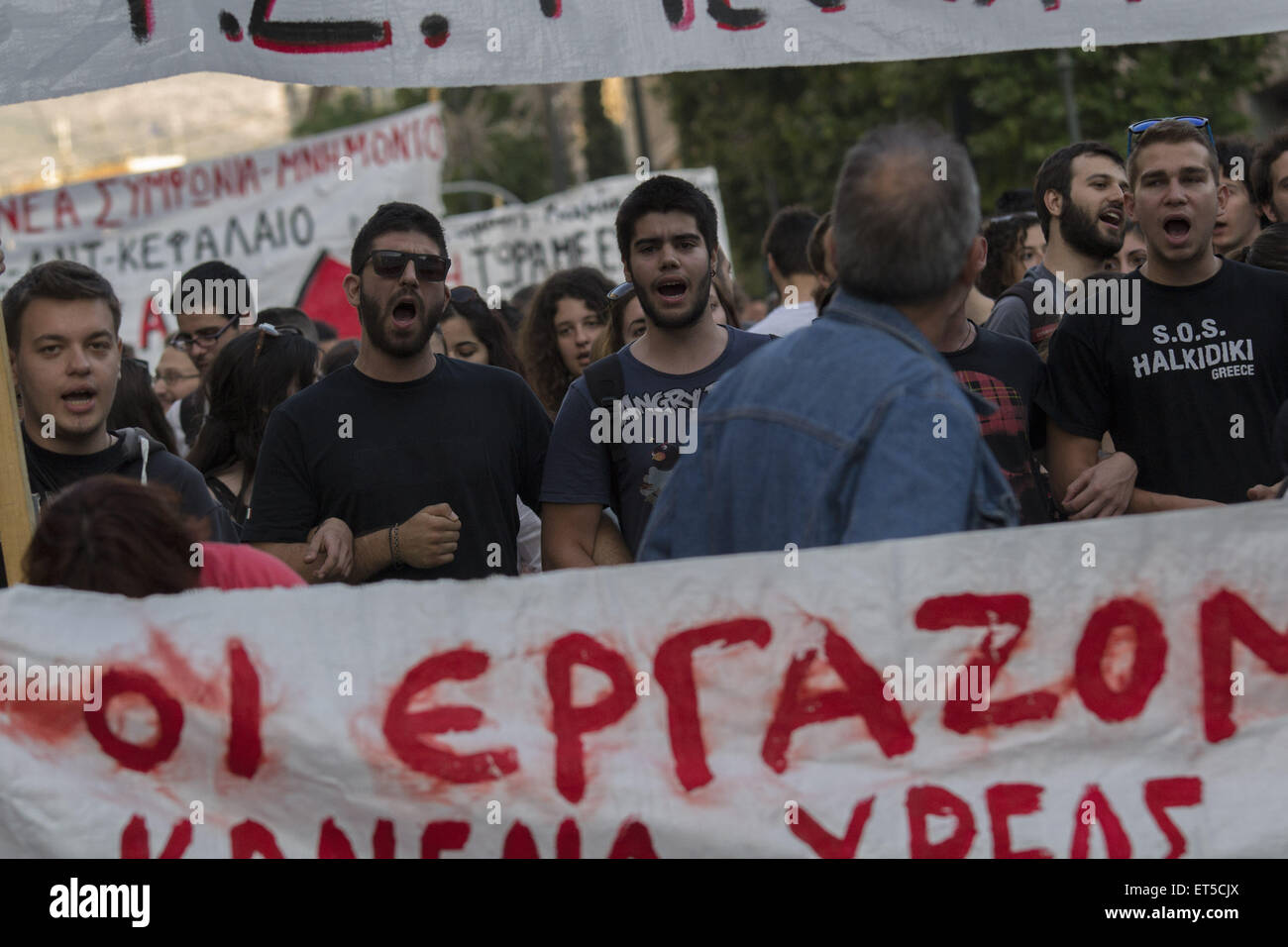 Athens, Greece. 11th June, 2015. Leftists march shouting slogans ...