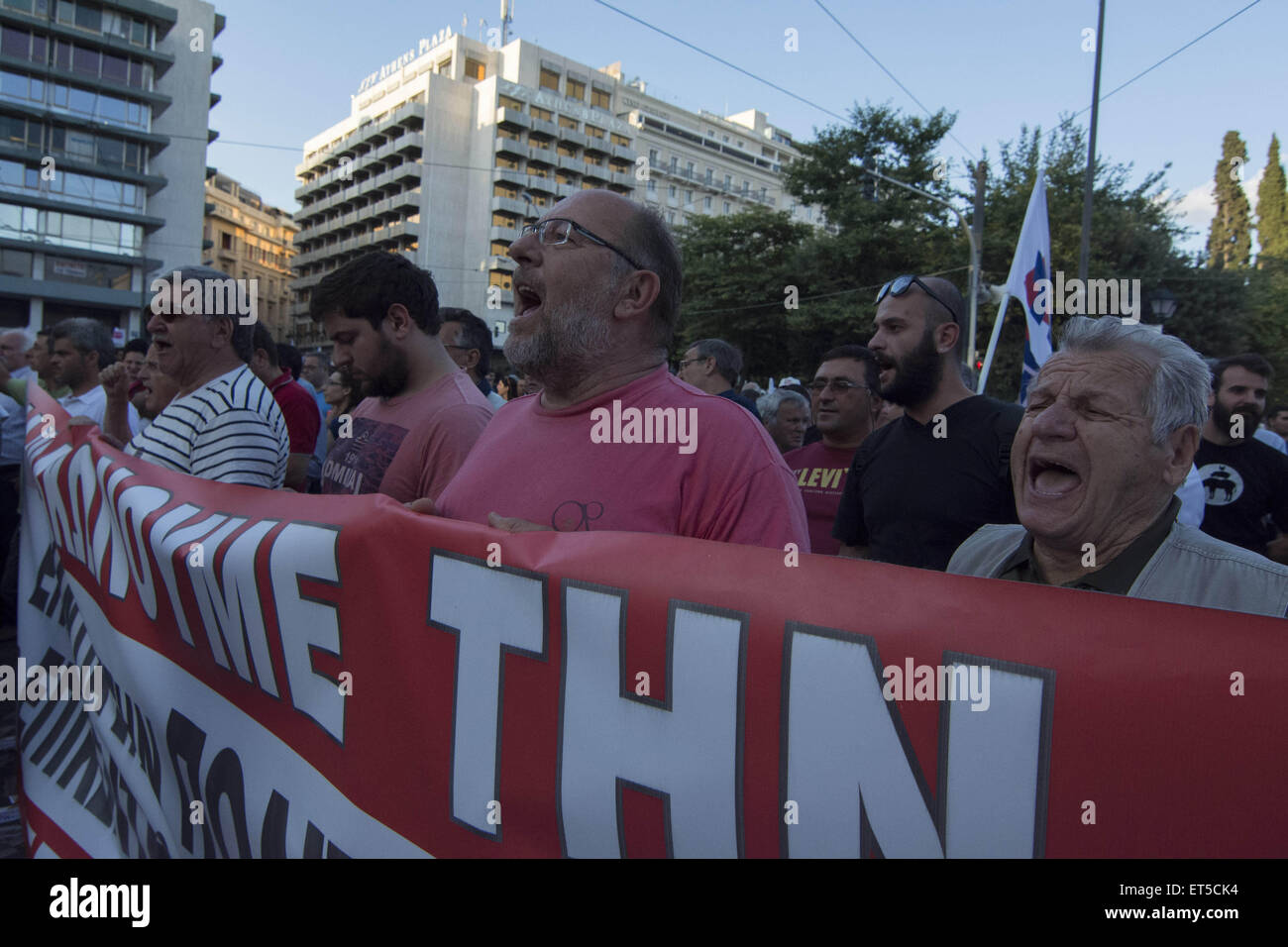 Athens, Greece. 11th June, 2015. Leftists march shouting slogans ...