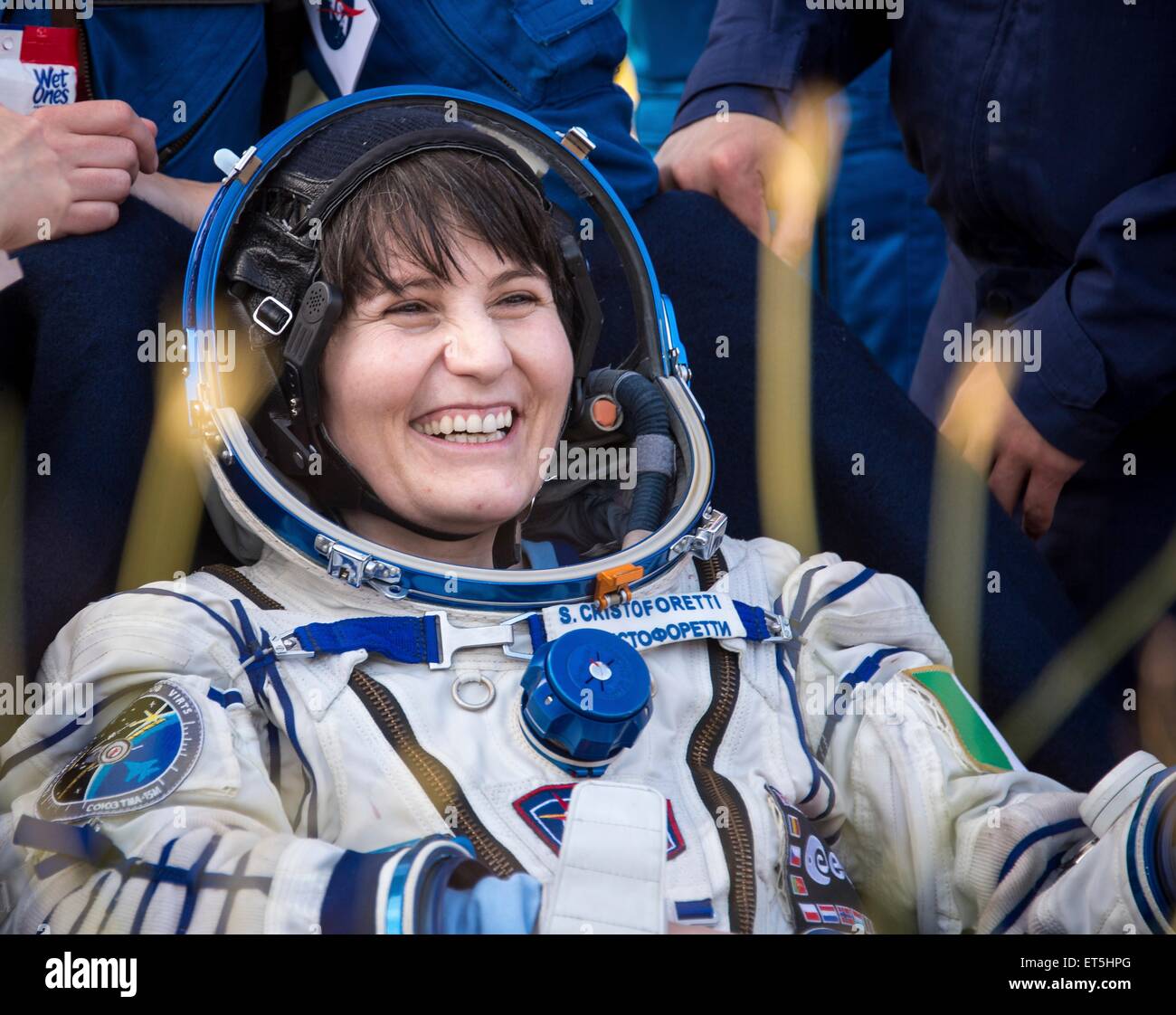 International Space Station Expedition 43 crew member Italian astronaut Samantha Cristoforetti from European Space Agency smiles moments after landing in a remote area June 11, 2015 near Zhezkazgan, Kazakhstan. The crew is returning after more than six months onboard the International Space Station. Stock Photo