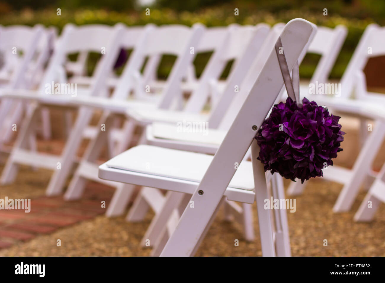 Chairs set for wedding in garden Stock Photo
