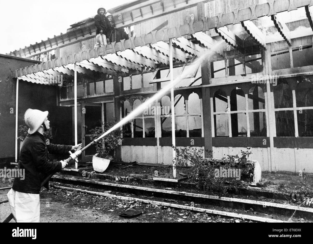 Firefighters tackle a blaze at the banqueting suite at Belle Vue, Manchester where valuable circus equipment was destroyed. October 1978. Stock Photo