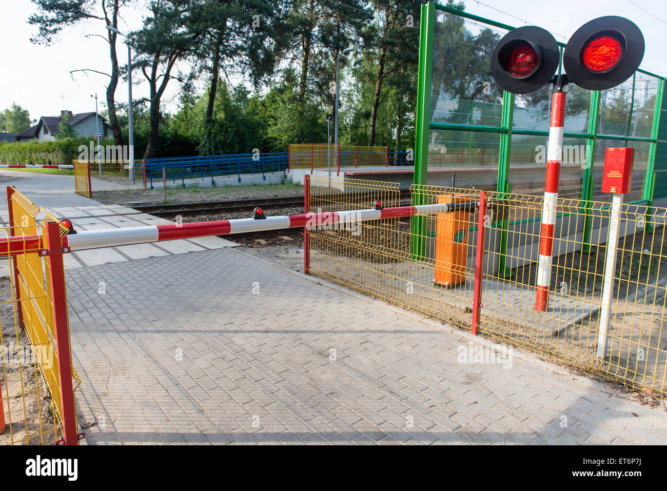 barrier at the railway crossing. railway station Stock Photo