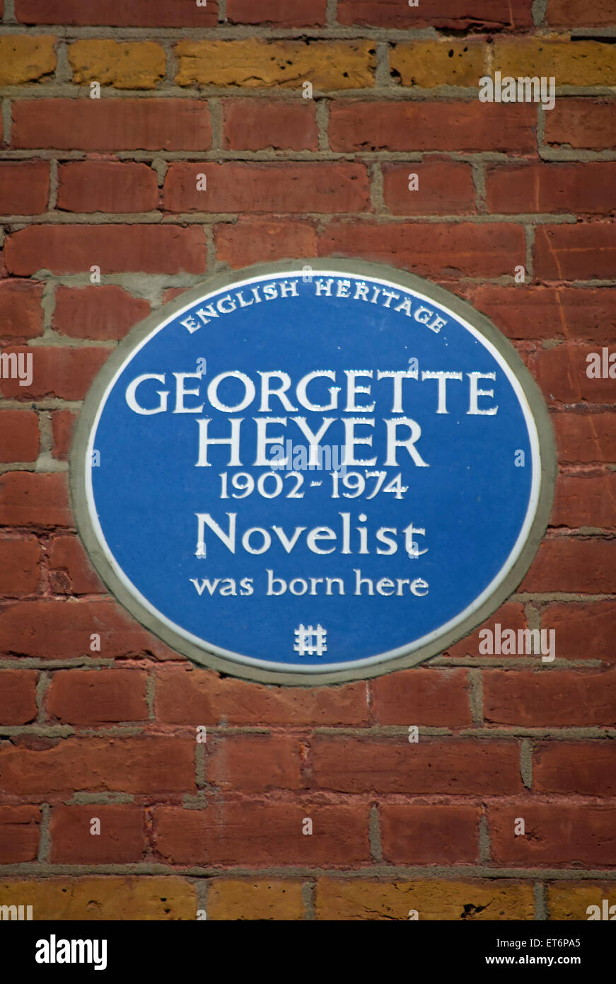 english heritage blue plaque marking the birthplace of novelist georgette heyer, wimbledon, england Stock Photo