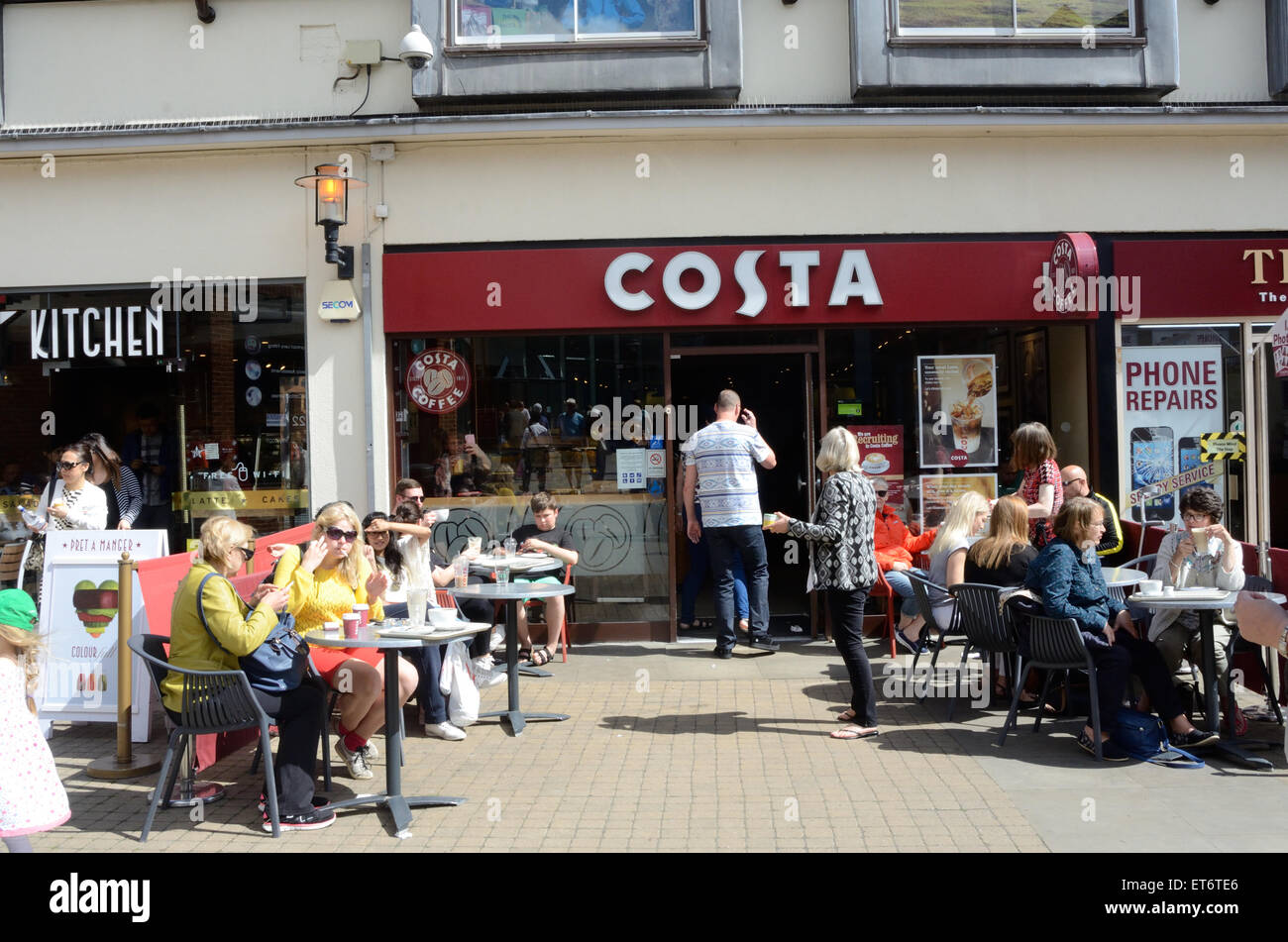 Costa coffee shop customers drinking hires stock photography and