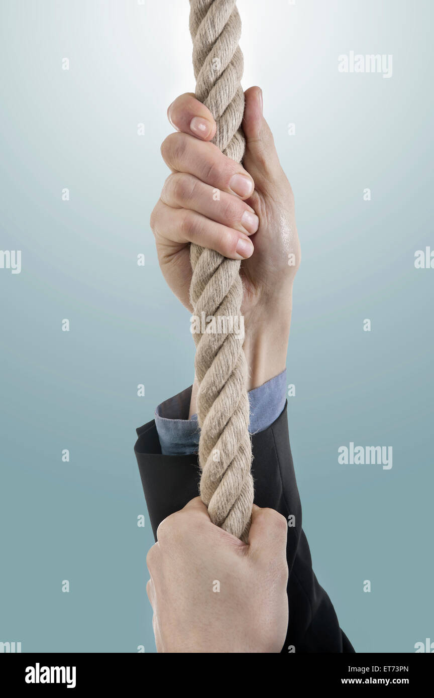 Hand Holding Rope Photos and Images