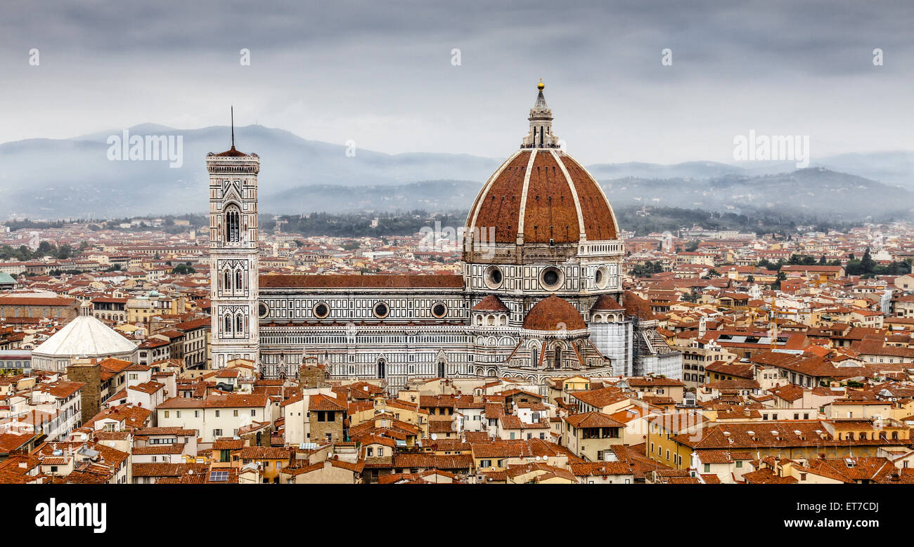 A landscape image of Florence, Italy, with the Santa Maria del Fiore Cathedral dominating the landscape. Stock Photo