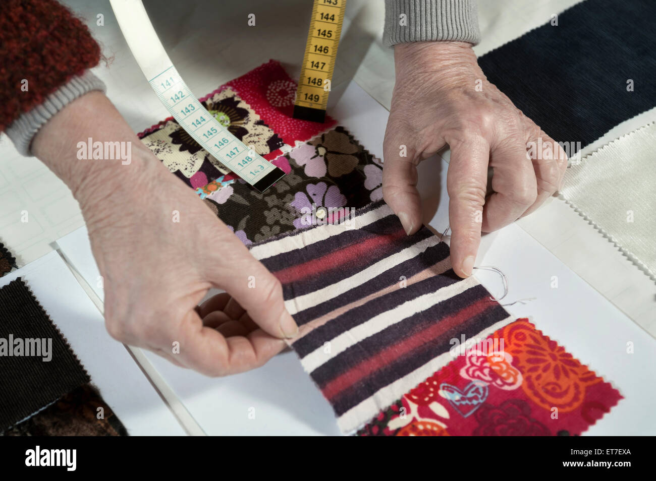 Senior female fashion designer working in workshop Bavaria Germany Stock Photo