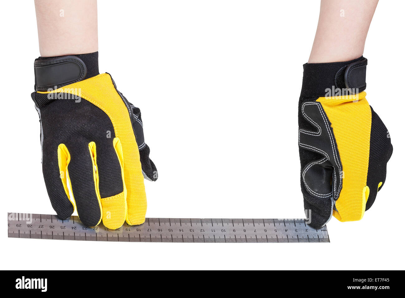 worker hands in protective gloves with ruler isolated on white ...