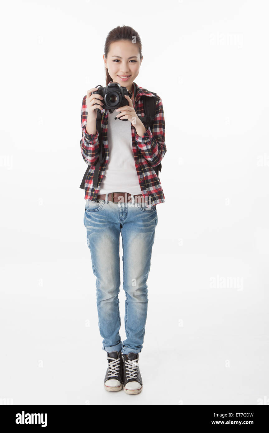 Woman with a camera hi-res stock photography and images - Alamy