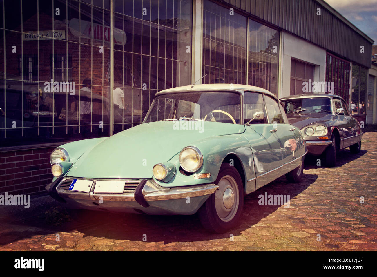 Germany, Moelln, two parking Citroen DS 21 Stock Photo