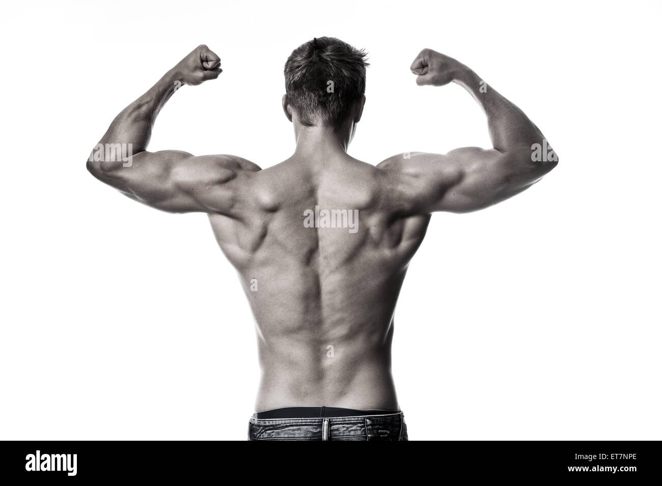 Bodybuilder Junger Mann Mit Muskuloesem Oberkoerper Von Hinten Young Man With Muscular Body Stock Photo Alamy