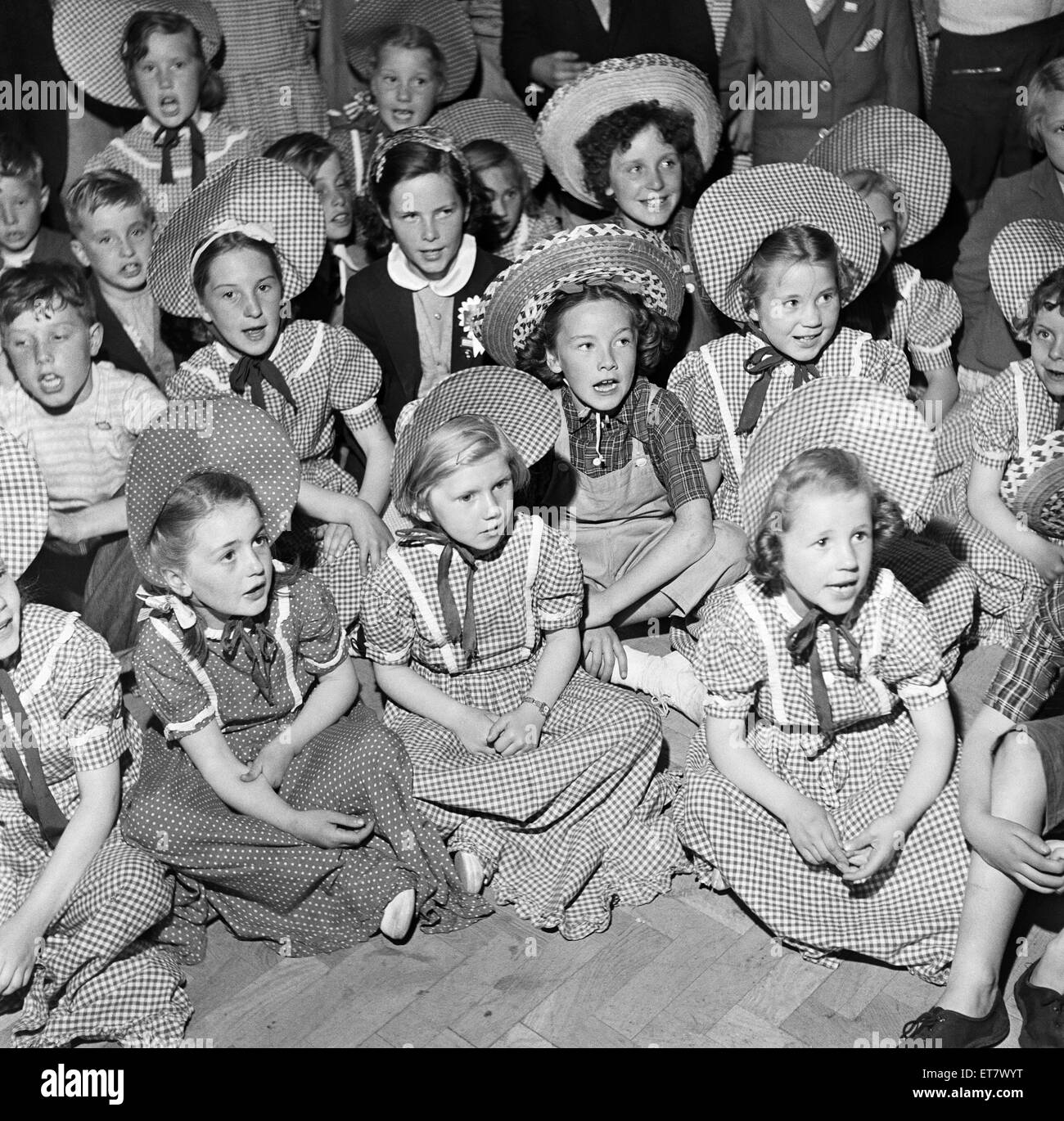 Children in traditional clothing at Butlins Holiday Camp, Filey, North Yorkshire. 30th July 1954. Stock Photo
